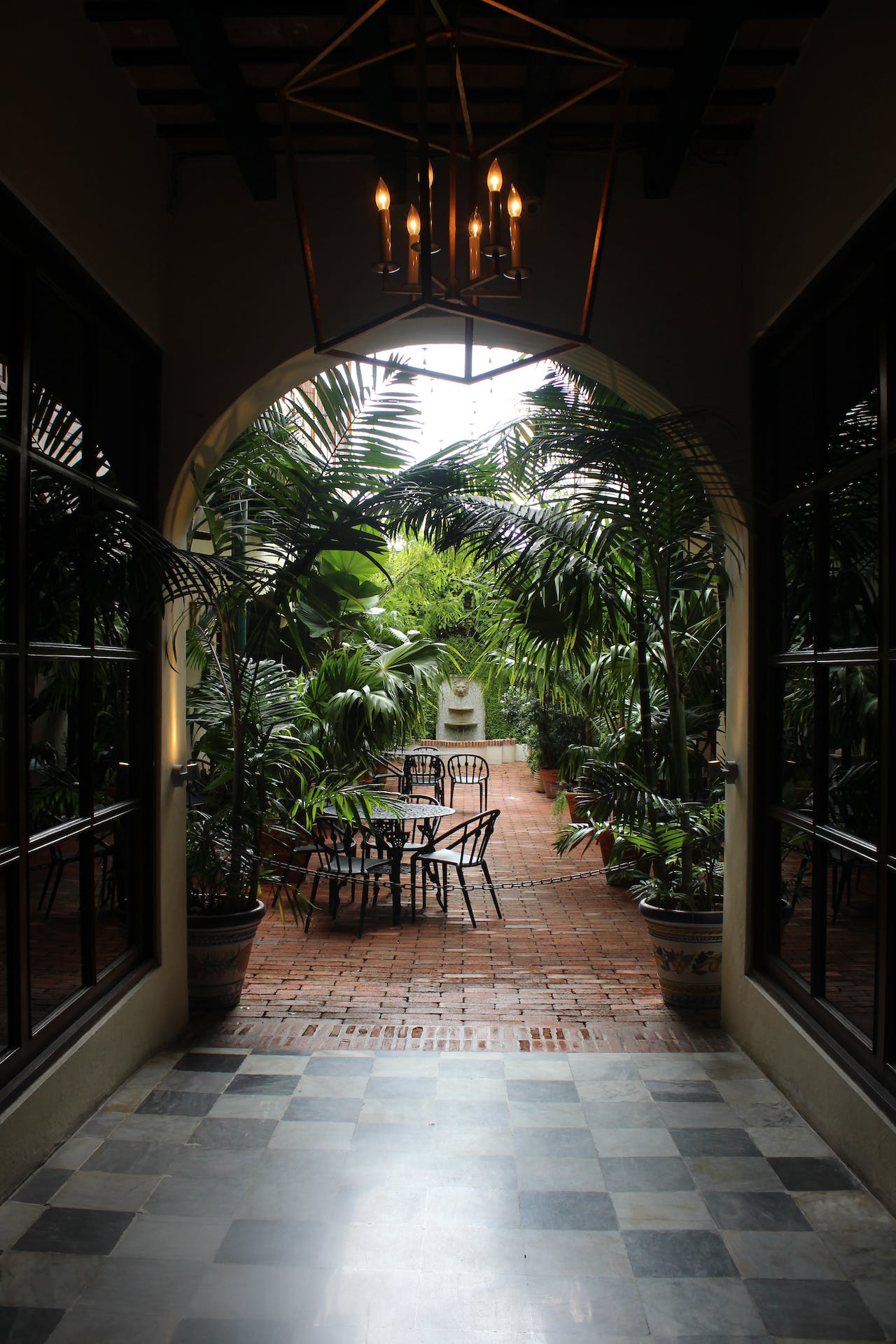 Hallway with a view of tropical plants outdoors